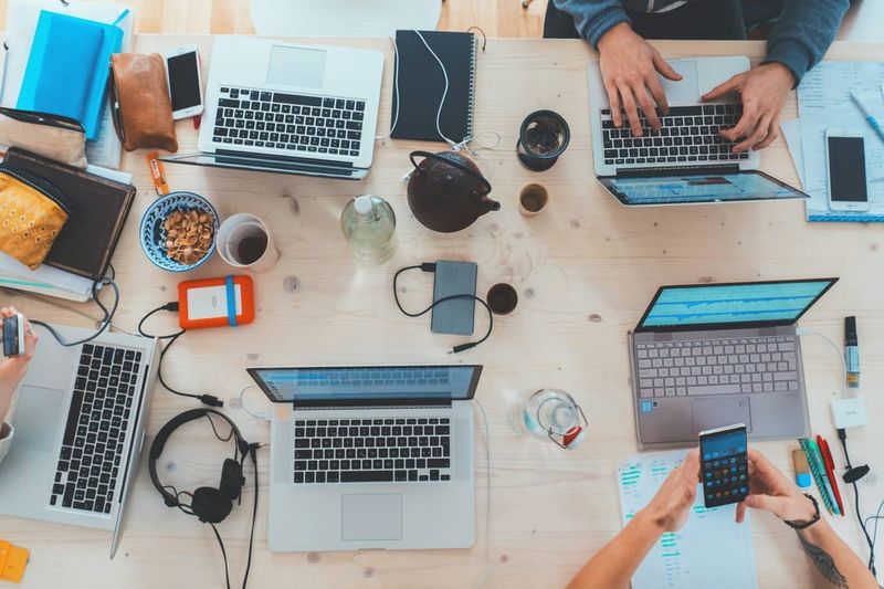 top view of a team desktop work area